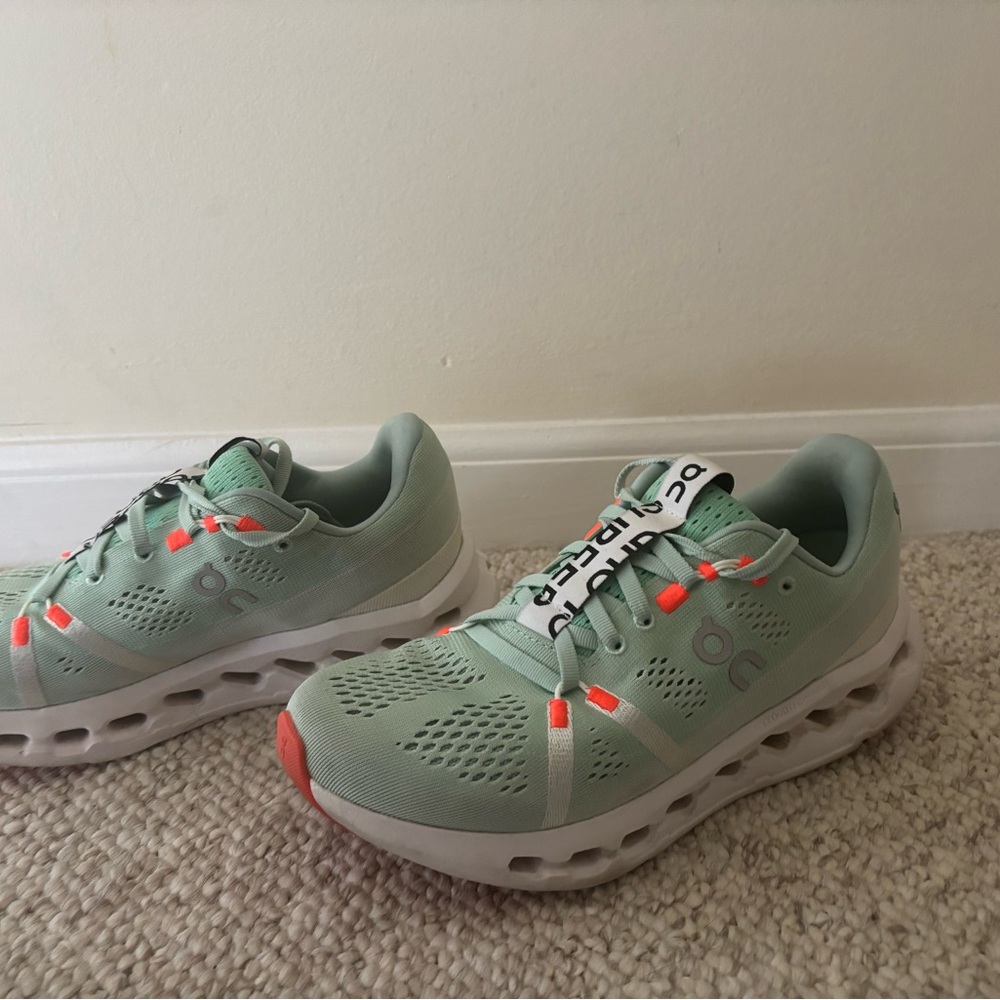On Cloudsurfer Running Light Green and Orange Sneakers
